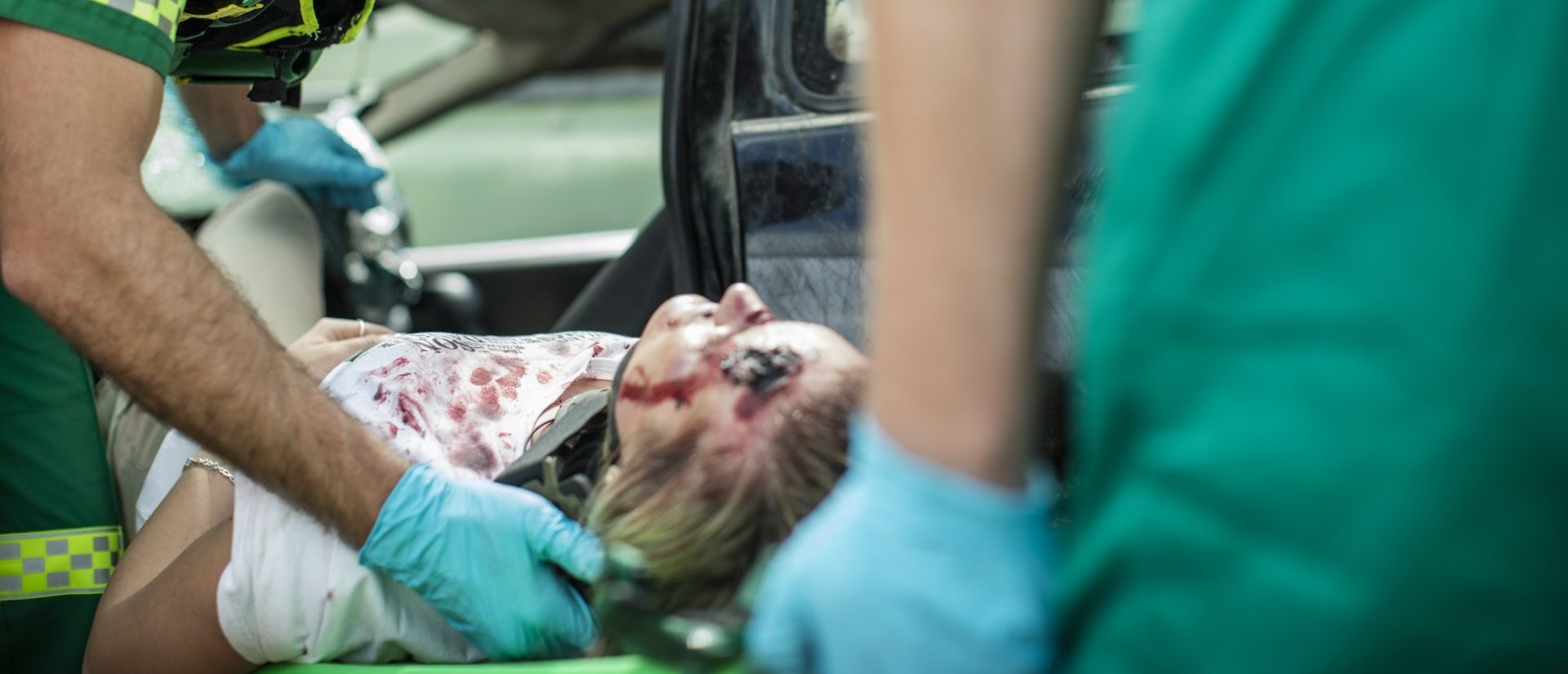 paramedics-moving-car-crash-victim-on-stretcher